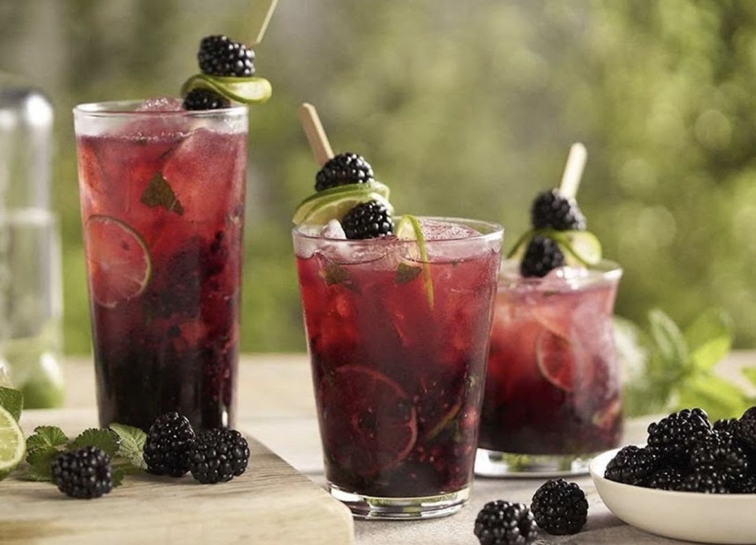 Berry mojito mocktails over crushed ice